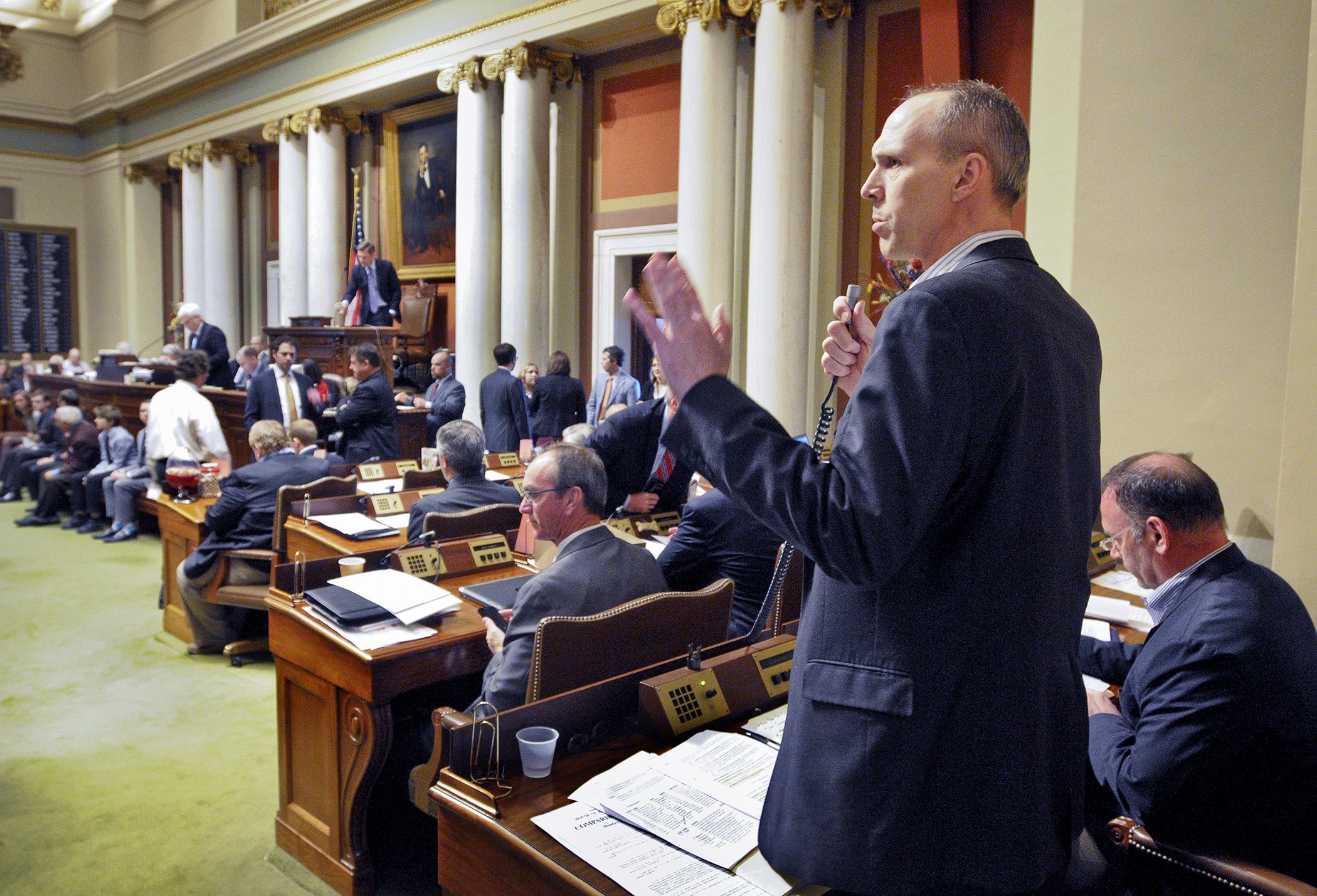 Rep. Rod Hamilton presents the omnibus agriculture finance bill on the House Floor May 4. Photo by Andrew VonBank